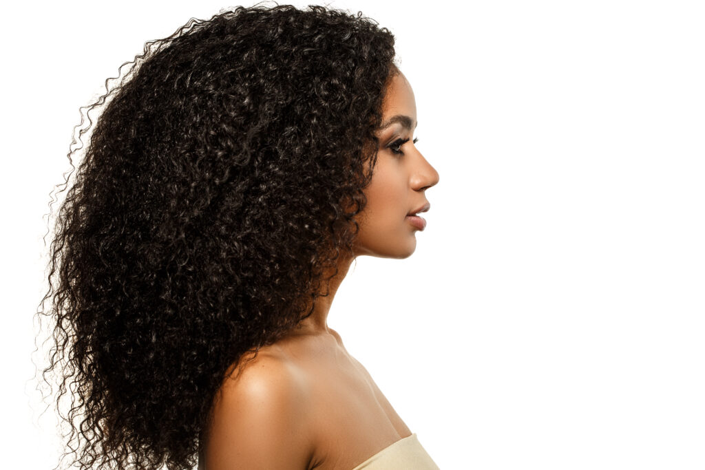 woman with curly dark hair that is natural