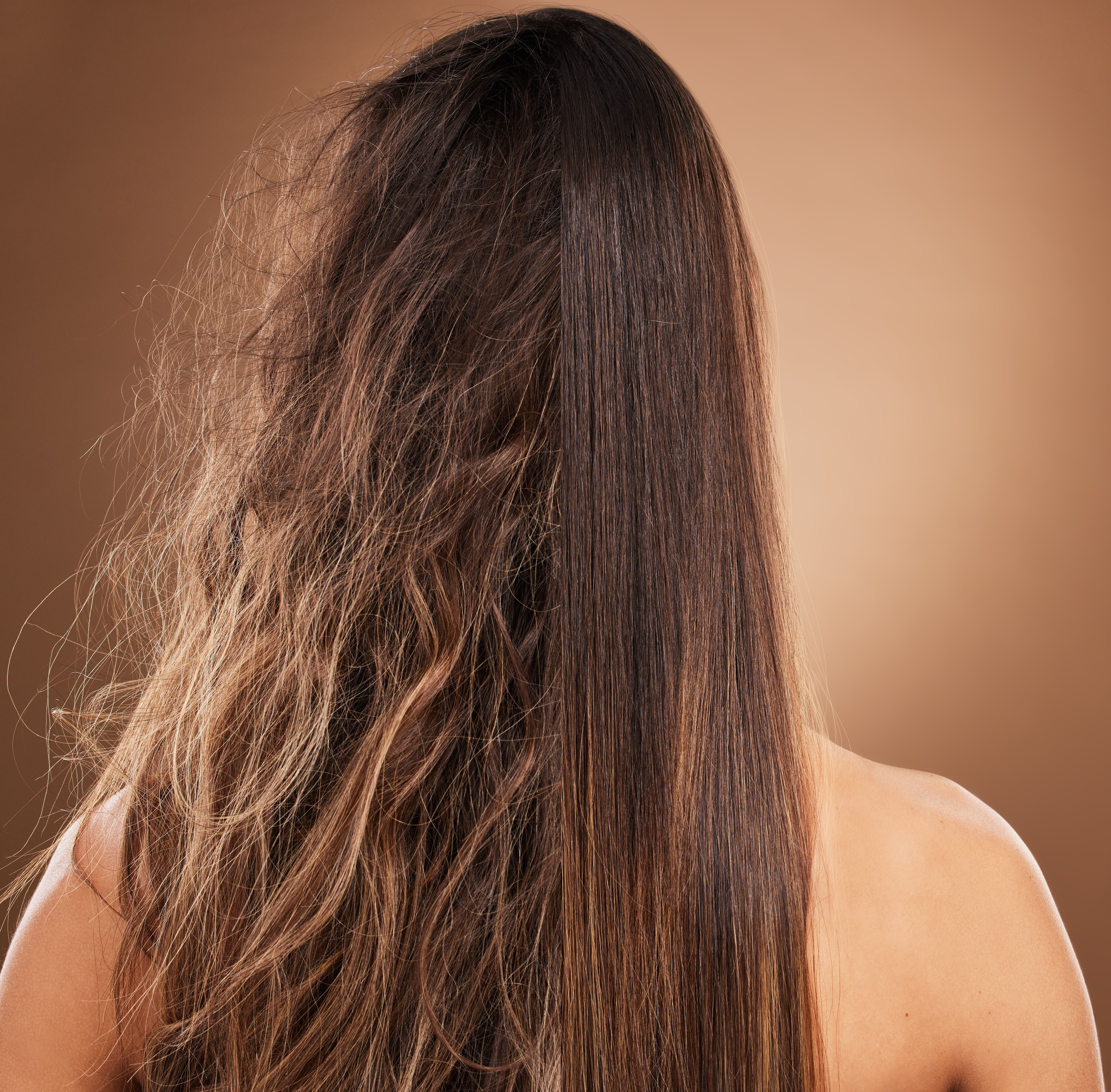 woman with a keratin treatment on half of her hair for comparison