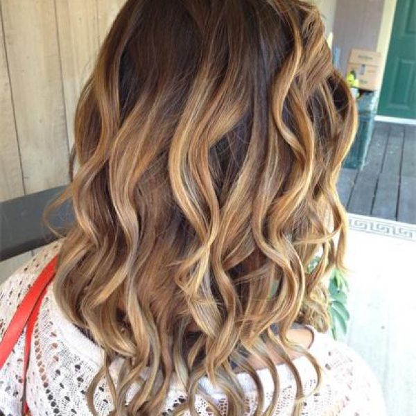 curly brown highlighted hair